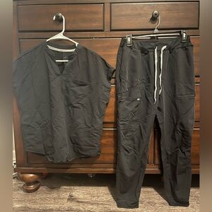 Set of good used condition Fabletics scrubs, top size, small bottoms size medium